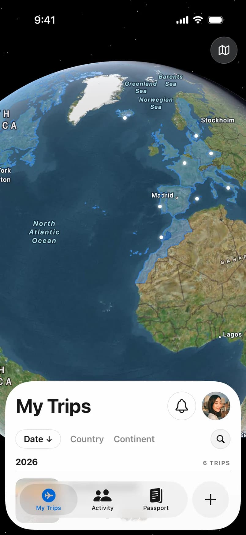 The home globe with visited places lit across the North Atlantic